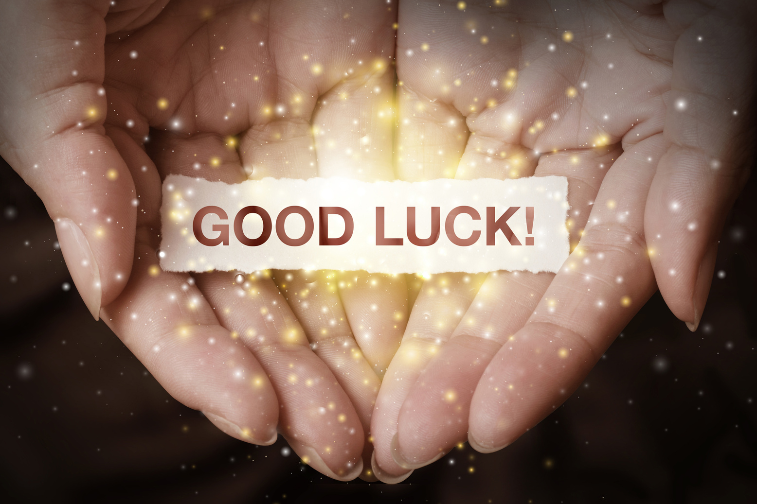 Good luck text on hand